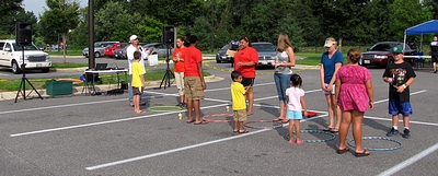 A nice game of hula hoops and water balloons